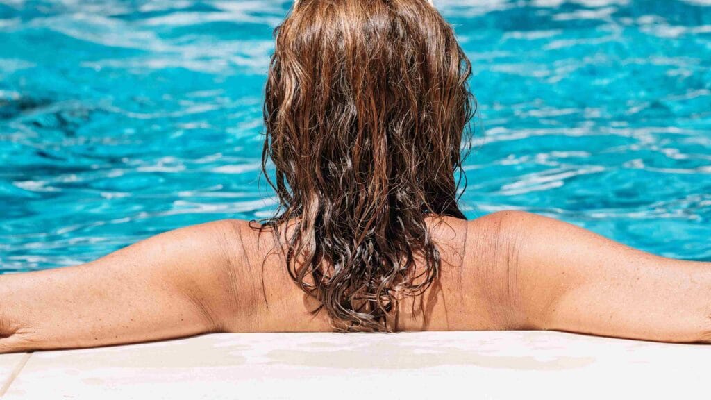 Why Pool Water Damages Wavy Hair